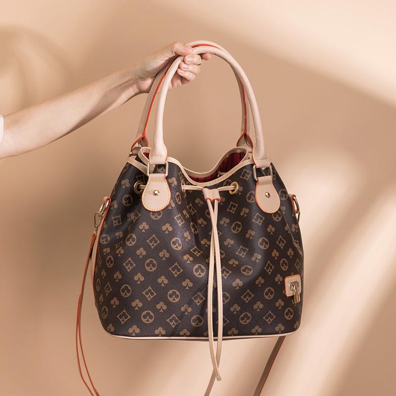 Bag women's spring new large-capacity women's bag fashion drawstring bucket bag printed portable shoulder messenger bag