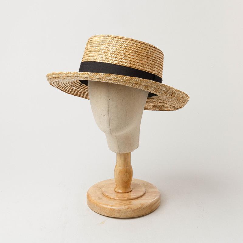 Spring and summer new bow decoration children's wide brim curled straw straw straw hat outdoor travel sun protection straw hat