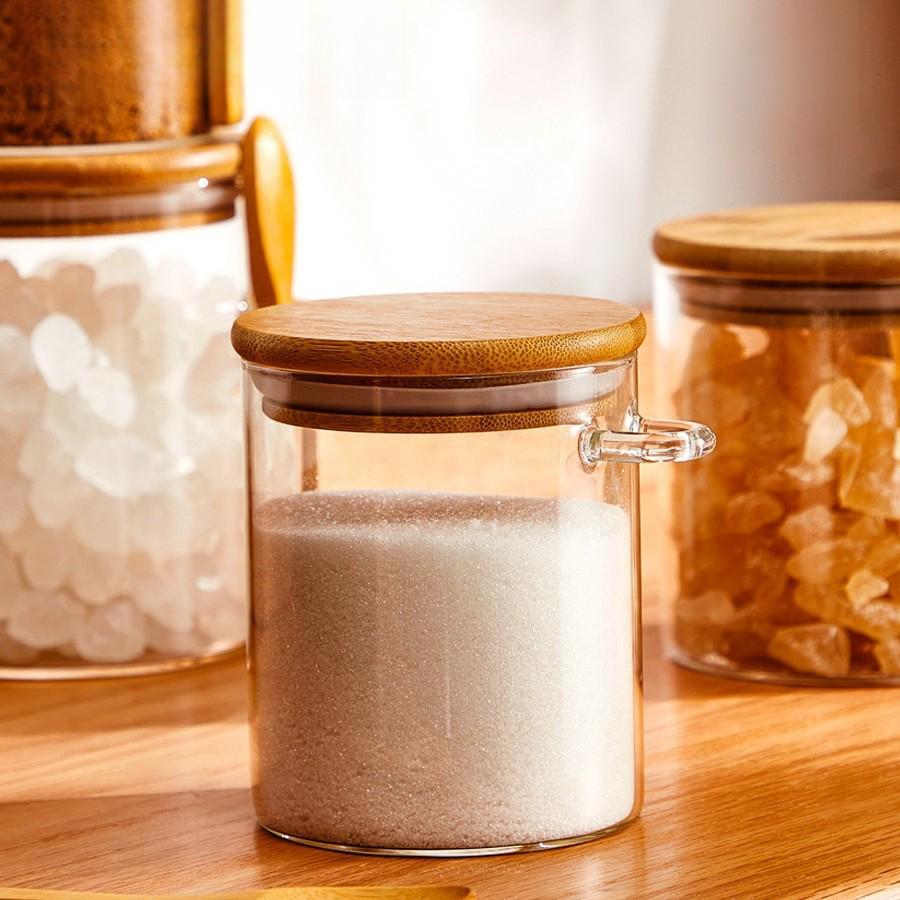 Round Glass Storage Jar with Spoon - High Borosilicate, Multi-purpose Transparent Sealed Container for Tea, Grains, or Flowers