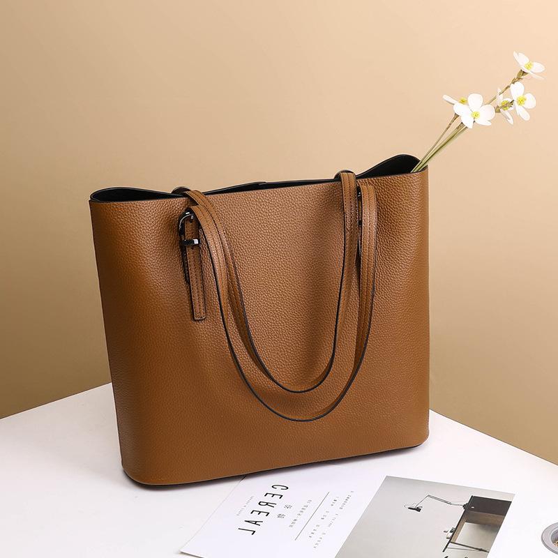 Bolso de mano de gran capacidad para mujer, moderno y versátil, de cuero, de alta gama.