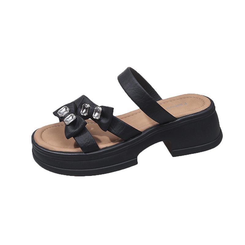Thick-bottomed slippers women's outer wear 2025 summer new muffin light stepping on shit fairy wind bow rhinestone sandals