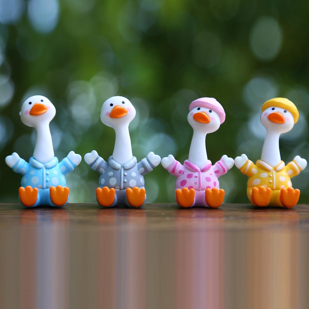 Pvc Whimsical Duck Toy With Eyes Tilted For Kids And Collectors