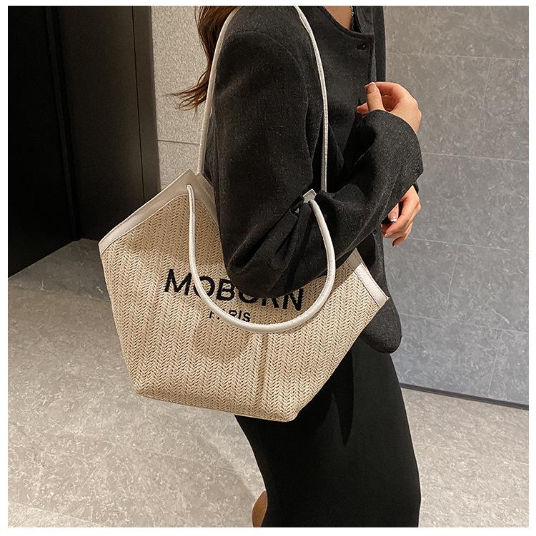 2025 Snygg Strandväska i Halm för Resor för Kvinnor: Mångsidig flätad axelväska