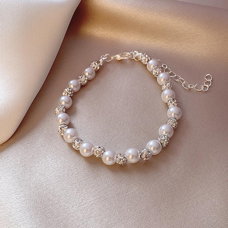 2025 Trendy Pearl Zircon Flower Bow Bracelet: Women's Chic, High-End, Versatile Design