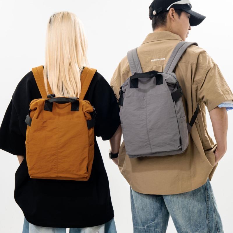 New large-capacity simple retro nylon backpack women's simple casual mailman bag male college student shoulder