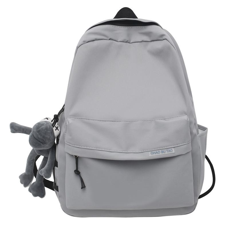 

Student schoolbag female 2023ins wind campus light and simple primary school students junior high school students backpack with pendant серый