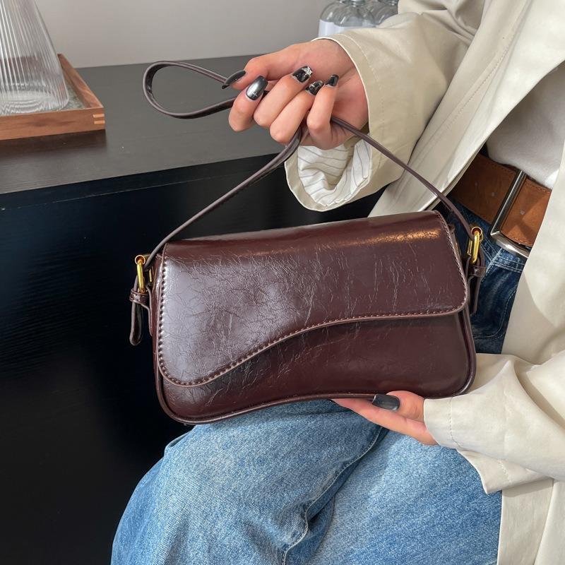 Fashion bag women's new retro autumn shoulder armpit bag commuter messenger solid color small square bag tide