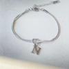 JXJ Jewelry 18k Gold Plated Stainless Steel Letter Pendant Knot Style Trendy Charm Bracelet for Anniversaries