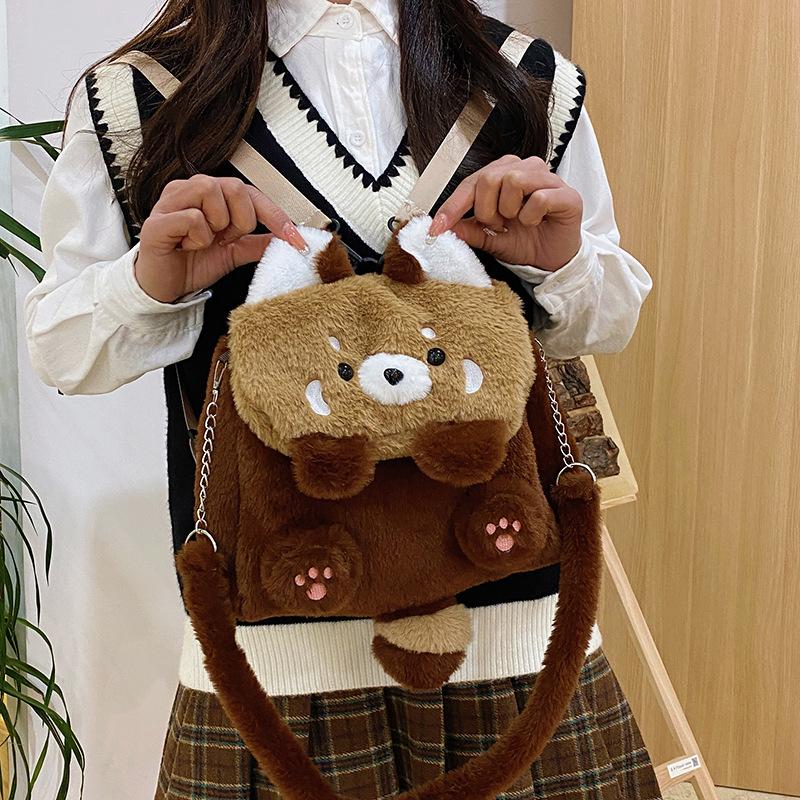 

2025 autumn and winter new raccoon plush bag doll doll cartoon cute schoolbag single backpack female коричневый