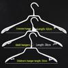 10-Piece Non-Slip Plastic-Coated Clothes Hanger Set with Stainless Steel Pants Rack and Spoon-Shaped Hooks, Free Shipping.