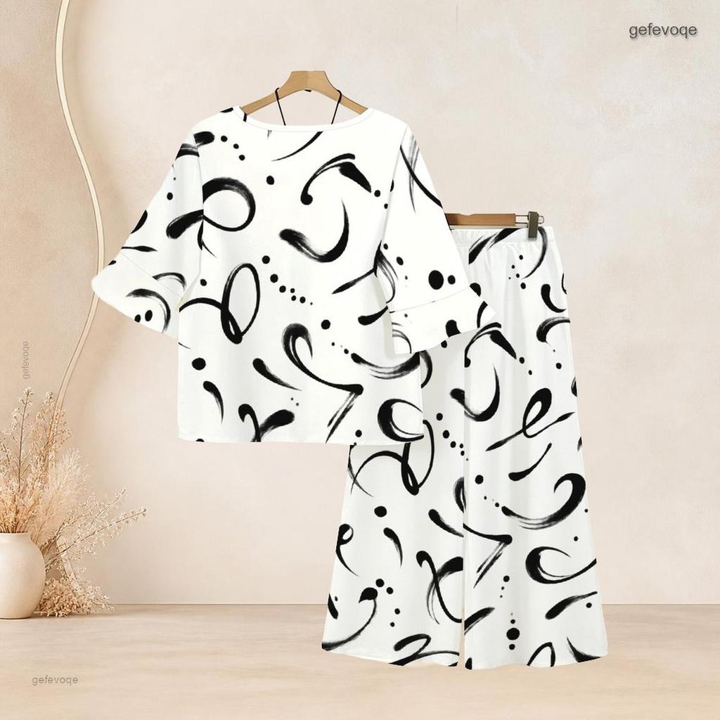 Women Plus Size Two Piece Set Round Neck Flared Half Sleeve Abstract Printed Black White Top And Long Pants
