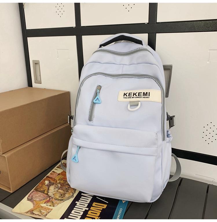 Schoolbag backpack men's 1011 new versatile large-capacity college backpack girls simple junior high school high school bag