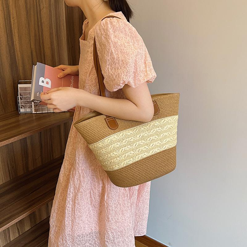Women s bag Korean version of summer new fashion woven design striped contrasting color women s armpit bag women s shoulder handbag