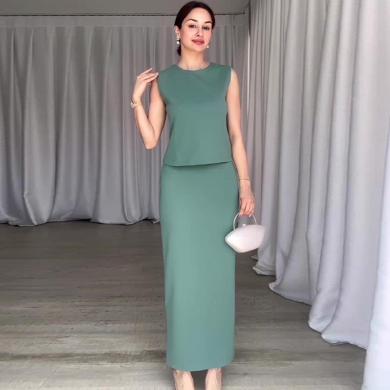 

Летний женский однотонный повседневный комплект из двух предметов с юбкой и круглым вырезом Small зелёный