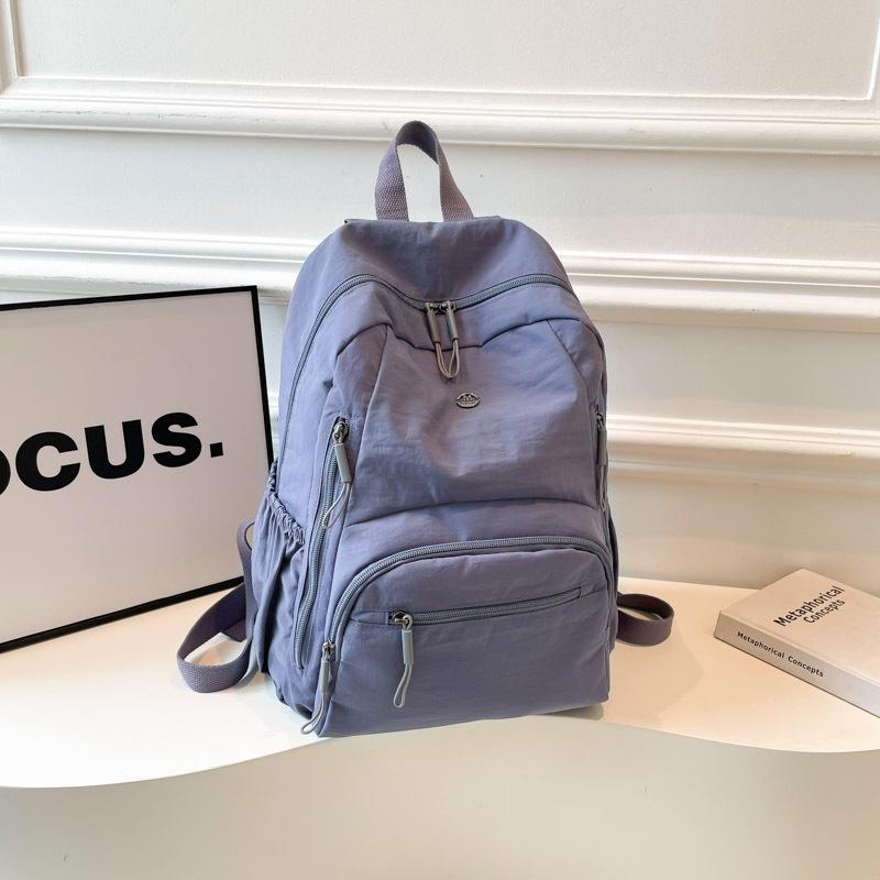 

Водонепроницаемый рюкзак из ткани Оксфорд большой вместимости 2025 - Модный и прочный для студентов фиолетовый