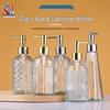 Pogrubiona przezroczysta szklana butelka wielokrotnego użytku na środek dezynfekujący, żel lub szampon