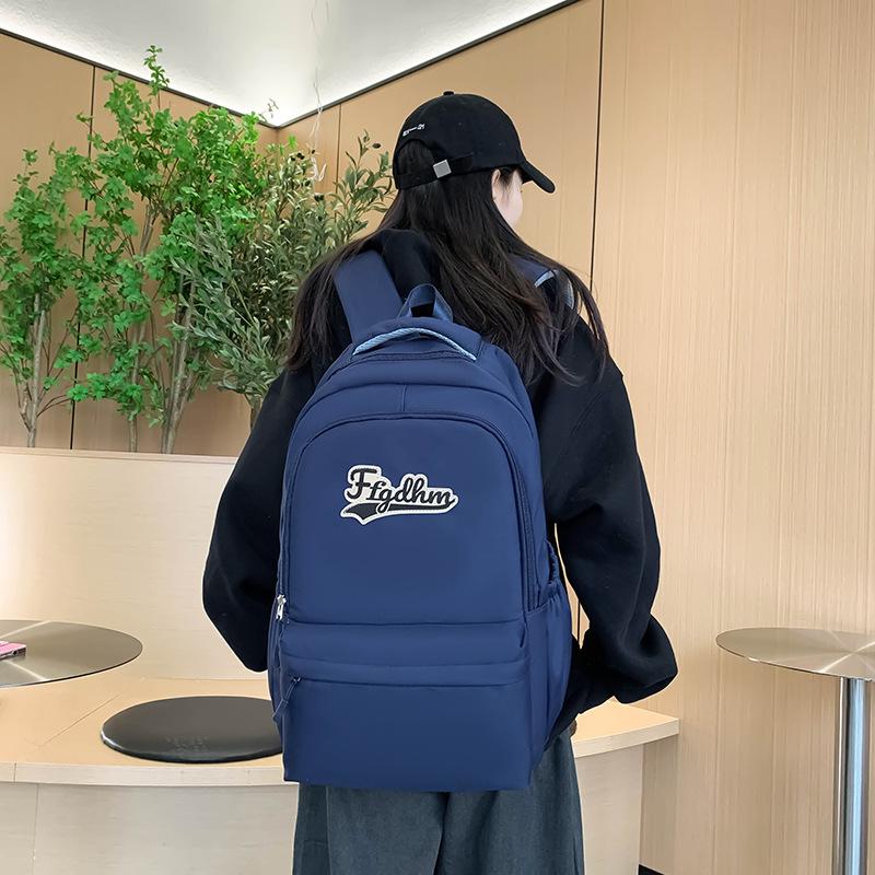 Weiblicher Rucksack mit großer Kapazität, einfarbig, Brief, Schüler, Schulranzen, männlicher Outdoor-Rucksack