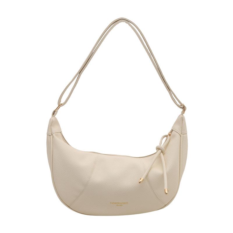 2025 new niche design fashion dumpling bag women's Korean version portable shoulder bag solid color splicing retro messenger bag