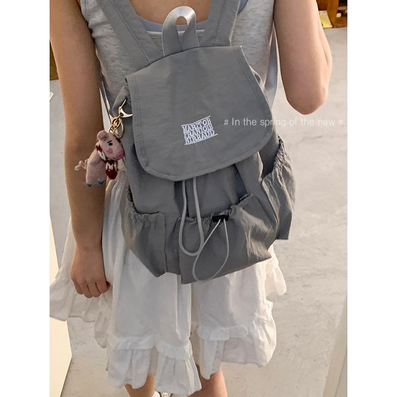 A Fashionable Letter Backpack with A Simple and Large-capacity Travel Bag