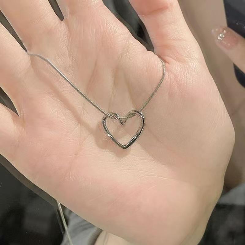 Women's Heart Pendant Clavicle Necklace - Simple, Hollow, Heart-Shaped Design
