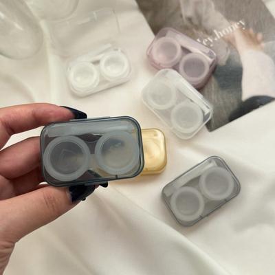 Contenedores y pinzas para lentes de contacto
