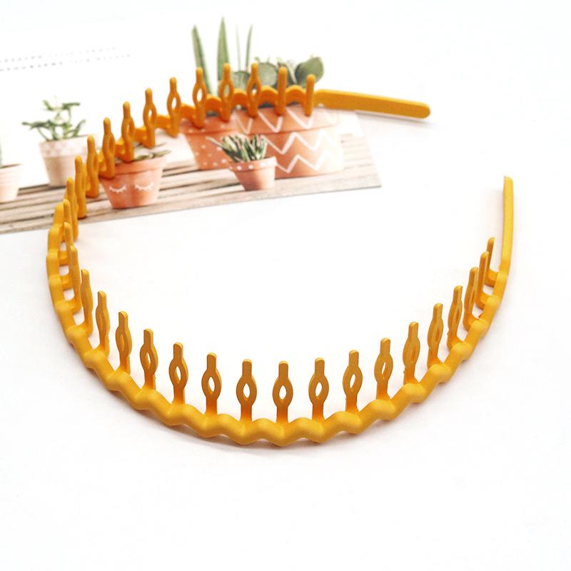 Buntes, wellenförmiges koreanisches Zahnkamm-Haarband - Rutschfest, schonend zum Haar, Bequemer Sitz, Ideal zum Bändigen von Babyhaaren.