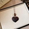 Retro Ethnic Heart Necklace: Wooden Flower Pendant Sweater Chain for Women