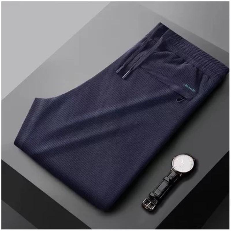 

Чоловічі весняно-осінні штани великого розміру вільного крою однотонні прості спортивні повсякденні штани L