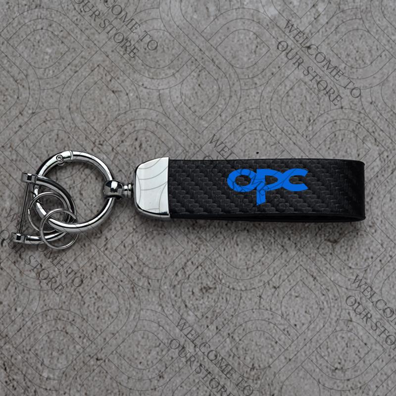 dalxrz1 daktpw1 Für Opel OPC LINE Logo Astra Insignia Zafira Grandland Mokka Movano Auto Kohlefaser Leder Autoschlüsselanhänger Personalisierte Schlüsselringe Geschenk gray