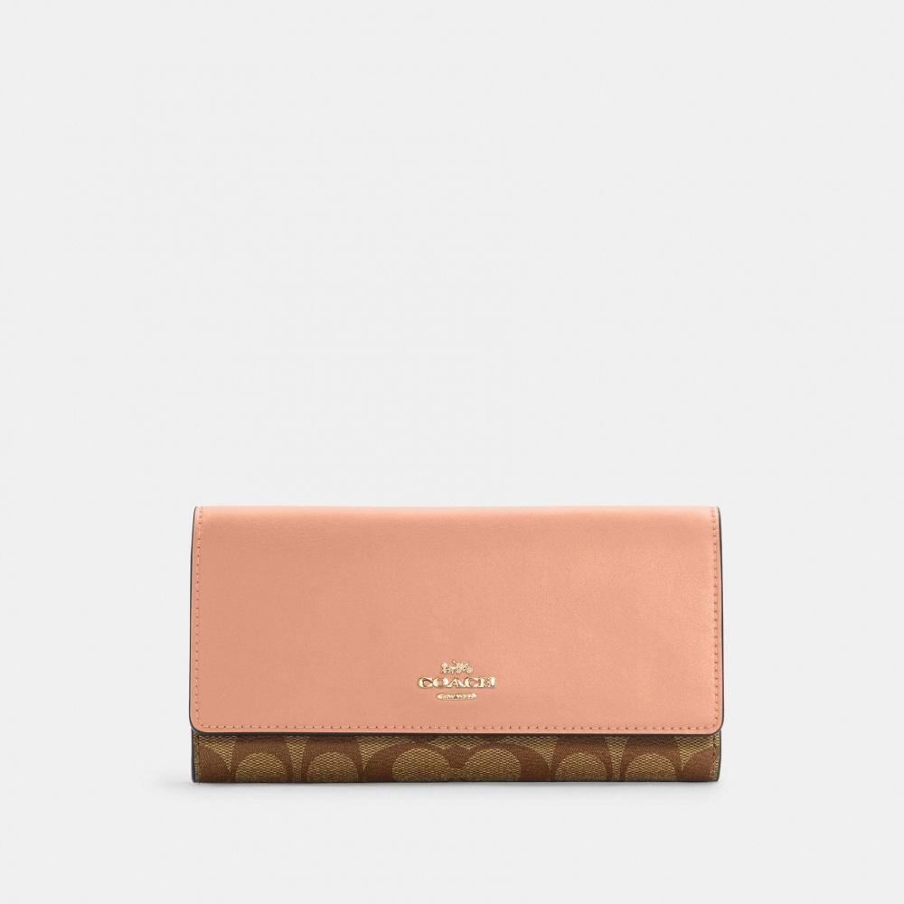 

Тонкий кошелек тройного сложения Coach из фирменной канвы