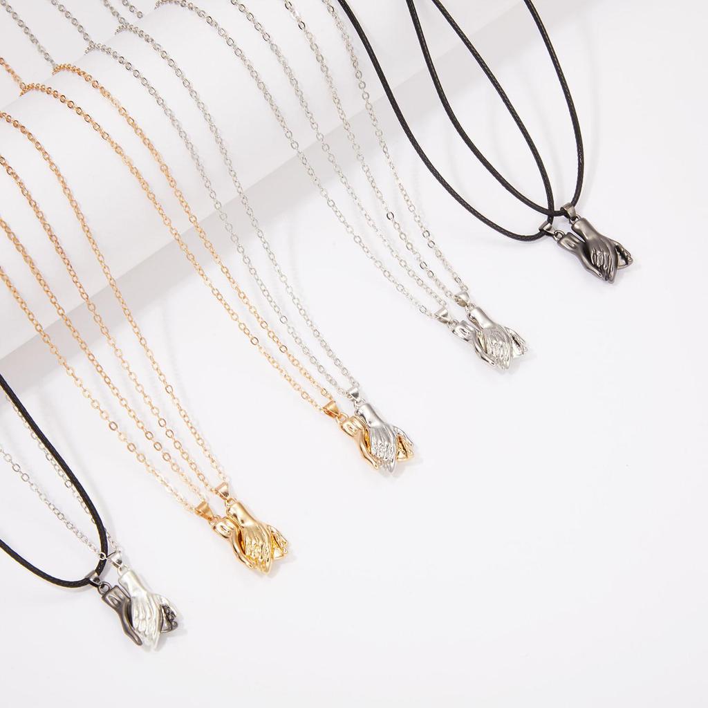 Magnetic Couple's Hand-in-Hand Necklace: Unique Design for Men and Women