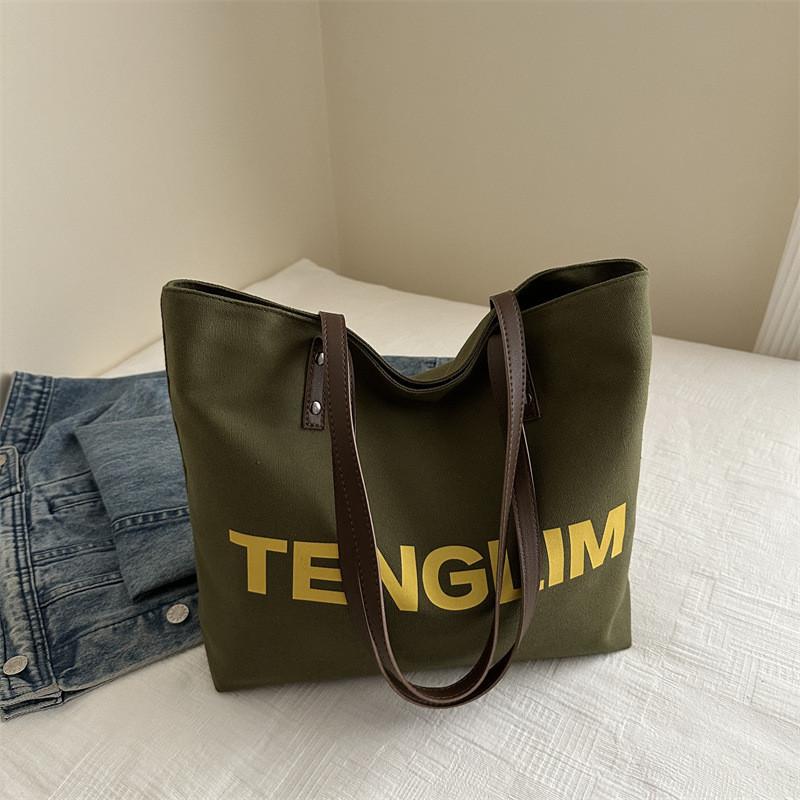 

Модная минималистичная сумка-тоут 2024 года для студентов колледжа в стильных цветах и вместительным дизайном зелёный