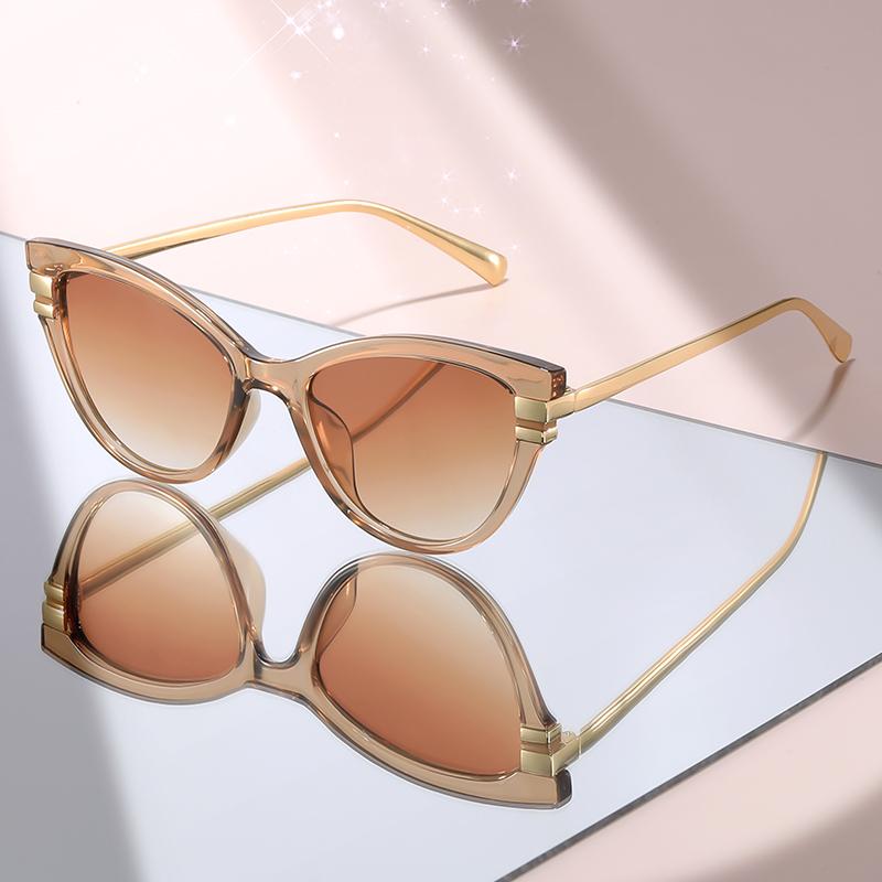 Fashion Cat Eye Sunglasses with Black Top Frame, Red Patterned Lower Frame, Gold Metal Arms, and Gradient Brown Lenses For