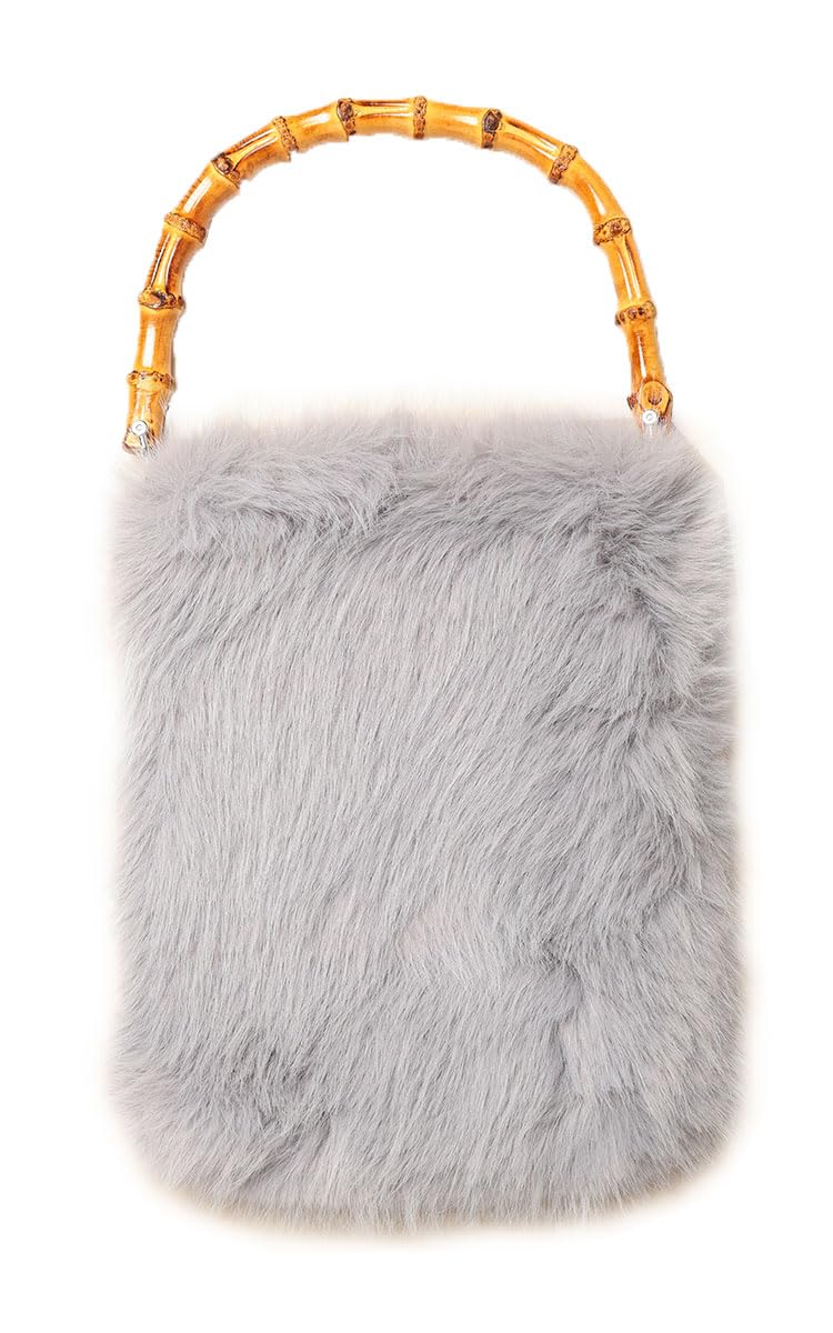 

Sawa á la mode s heart-fluttering faux fur square handbag. This versatile handbag features a faux fur lining and a simple, multi-material design