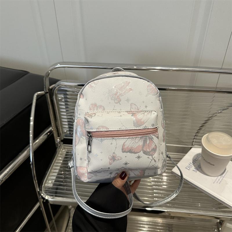Schoolbag new 1011 high-value printed butterfly dance fashion backpack bag fashionable versatile super good-looking summer foreign-style women's bag