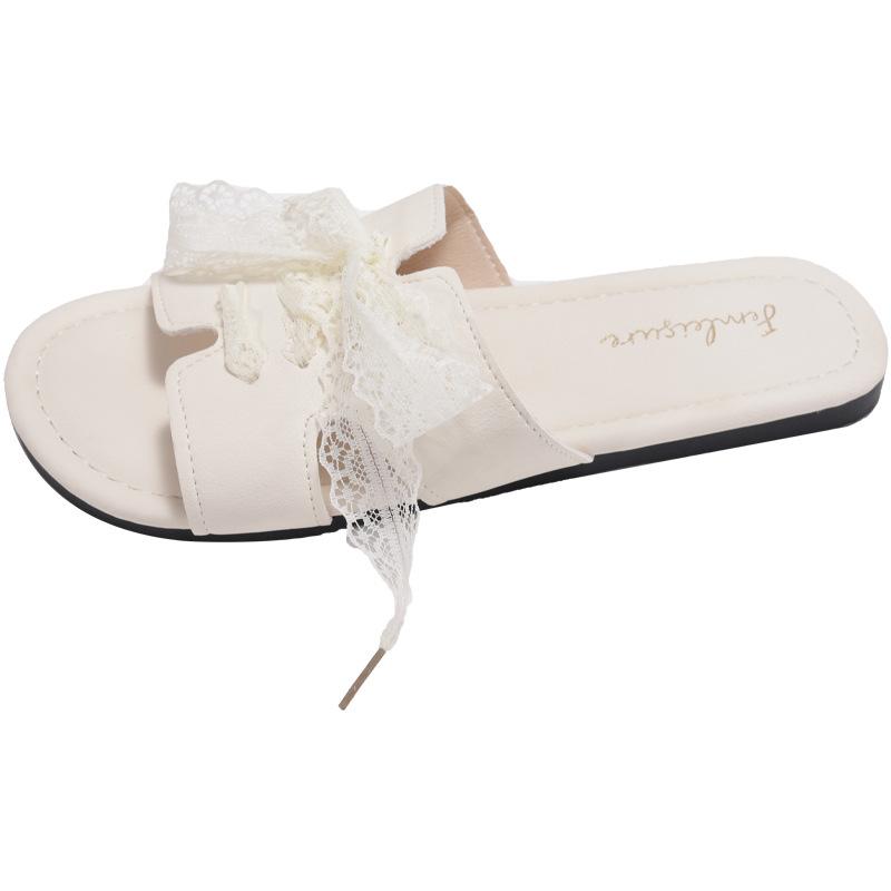 

2025 summer new Korean version flat-bottomed slippers women s open-toe one-word drag hollow casual lace-up sandals 35