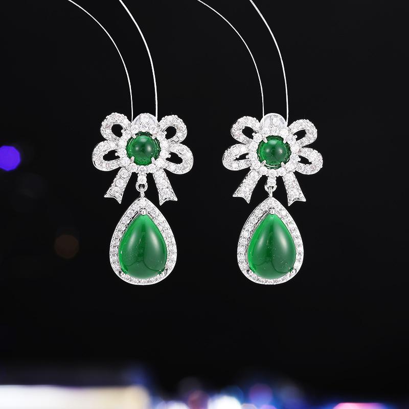 Women's Light Luxury Design Elegant Hollow Bow Pendant Earrings Fashionable And Versatile Niche Design Earrings