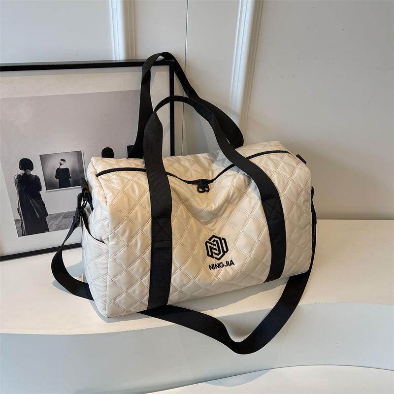 

Большая вместительная сумка 2024 года, новый деловой дорожный багаж для женщин, универсальная портативная дорожная сумка премиум-класса