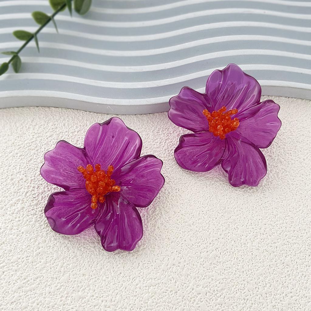 Exaggerated, individualistic, trendy and fashionable acrylic transparent flower stud earrings are versatile and stylish for street style