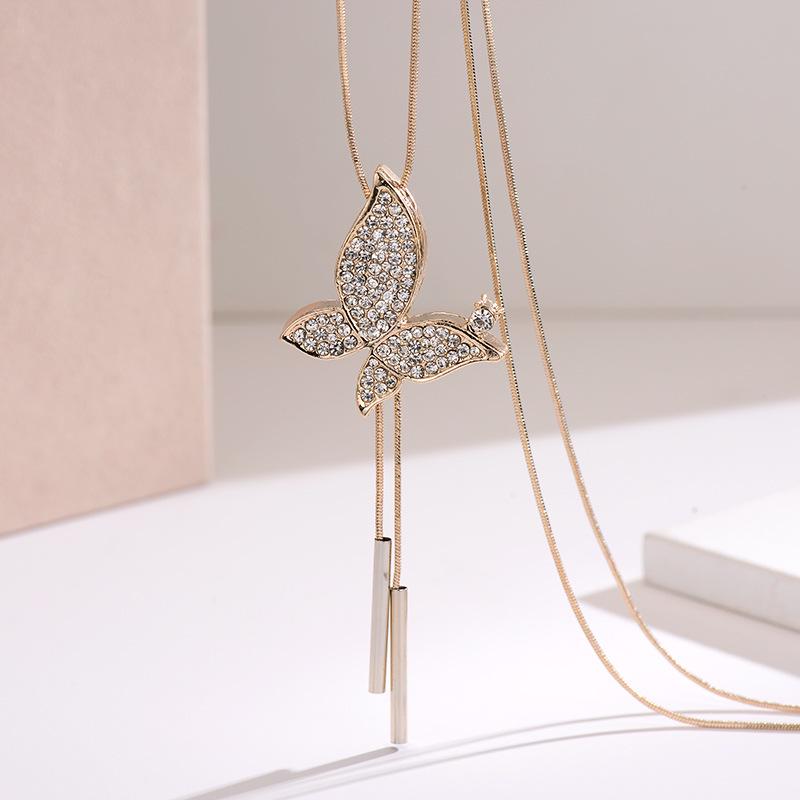 Butterfly Rhinestone Bow Tassel Necklace for Women - Fashionable Sweater Chain Pendant Accessory