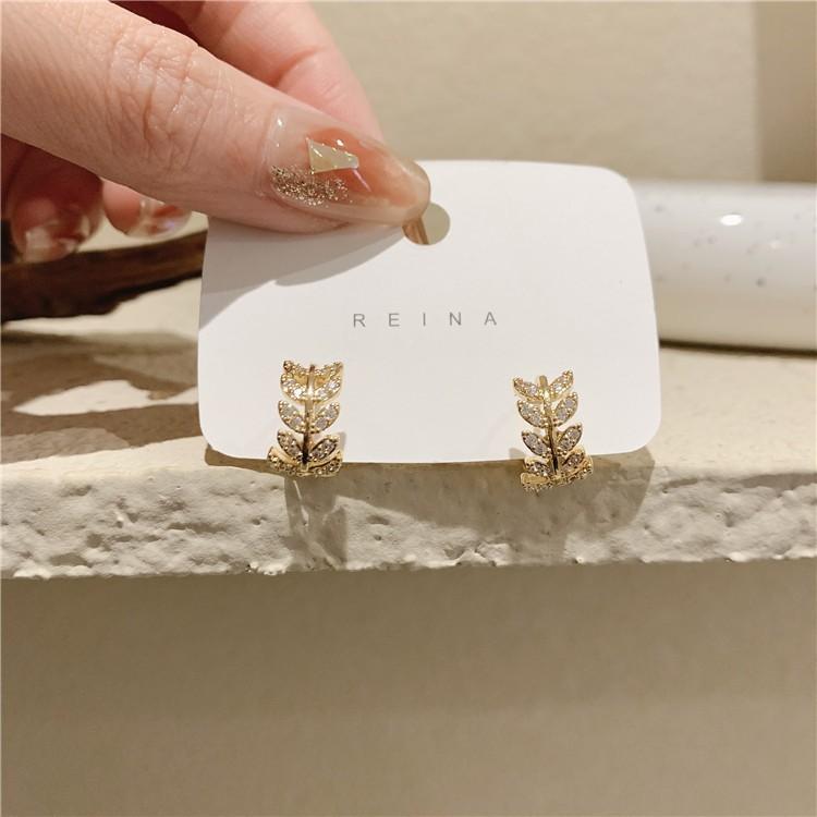 

Korean high-end leaf earrings women s autumn and winter earrings new trendy and popular niche light luxury earrings