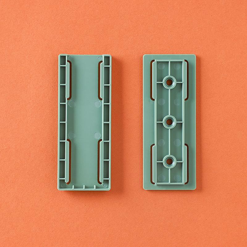 Punch-Free Socket Holder: Traceless, Detachable Wall Mount with Strong Self-Adhesive Hook for Bedroom and Study