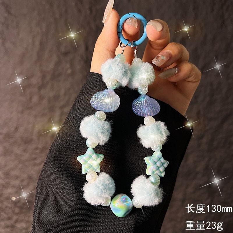 Nuova Catena per Telefono Autunno Inverno con Pom-Pom, Stella Marina, Conchiglia e Perline per Donne, Catena per Telefono alla Moda, Cinturino da Polso Portatile