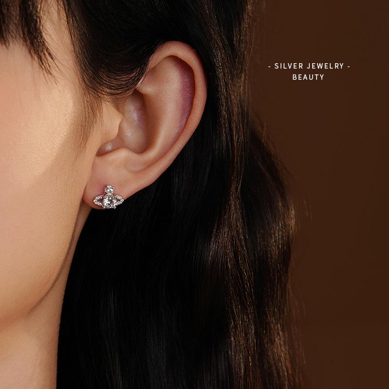 Ohrstecker Saturn aus S925 Sterlingsilber im koreanischen Stil für Damen - Mit Diamanten besetzt, super glänzend, kleines leicht luxuriöses Zirkon-Design