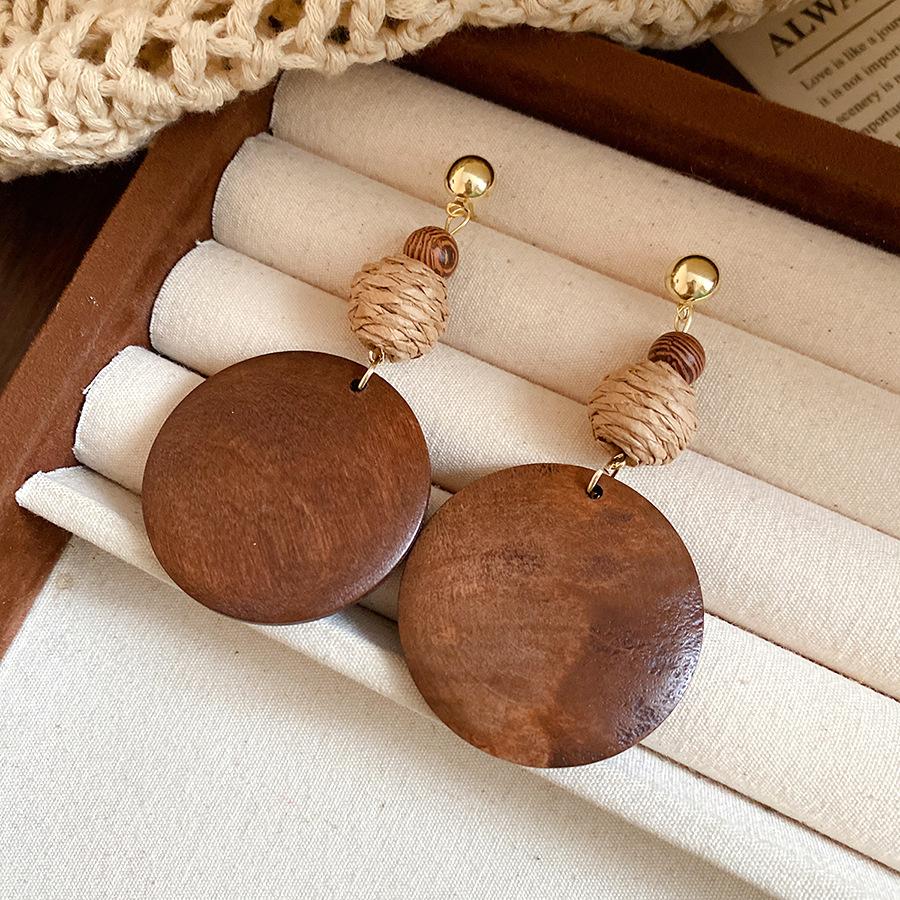 

Silver needle raffia wood round pendant earrings niche design stud earrings ethnic style retro temperament earrings women