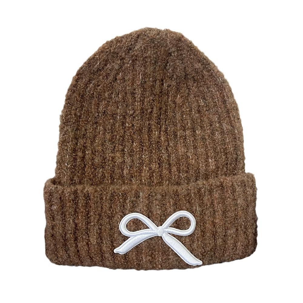 Hat women's autumn and winter wool hat new cute bow versatile cold hat ear protection warm knitted hat tide