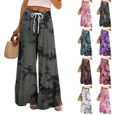Pantaloni palazzo estivi da donna, stile boho, a vita alta, larghi, con stampa floreale e tasche.