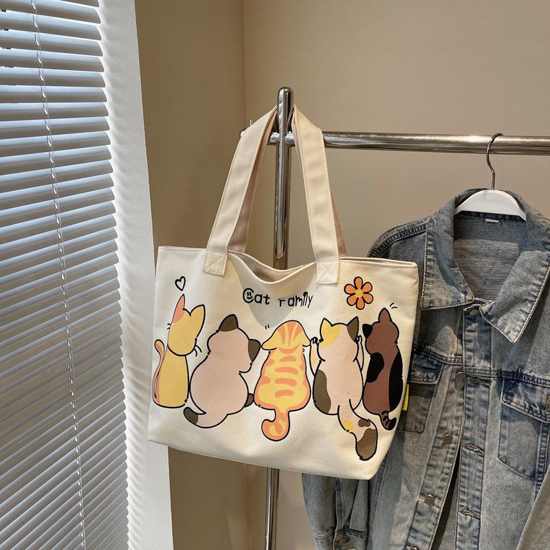 Cartoon cute tote bag women's new versatile canvas shoulder bag large-capacity class commuter bag