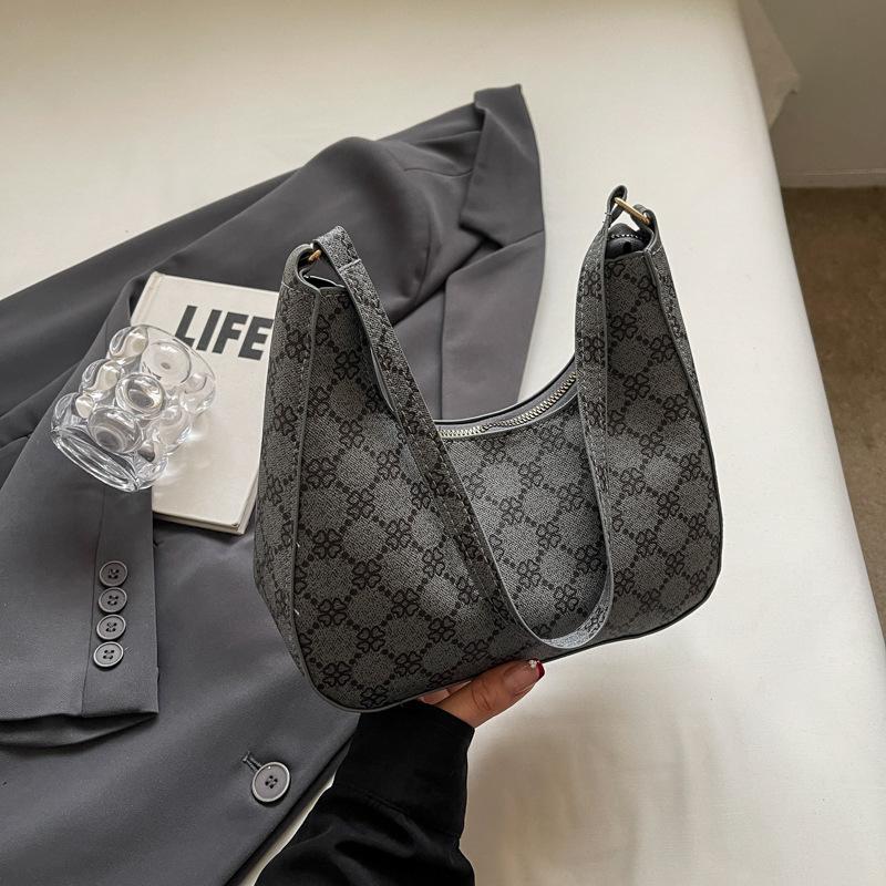 

Европейский и американский темперамент дизайн ретро стиль сумка женская мода одно плечо подмышкой женская сумка простая и модная сумочка тренд