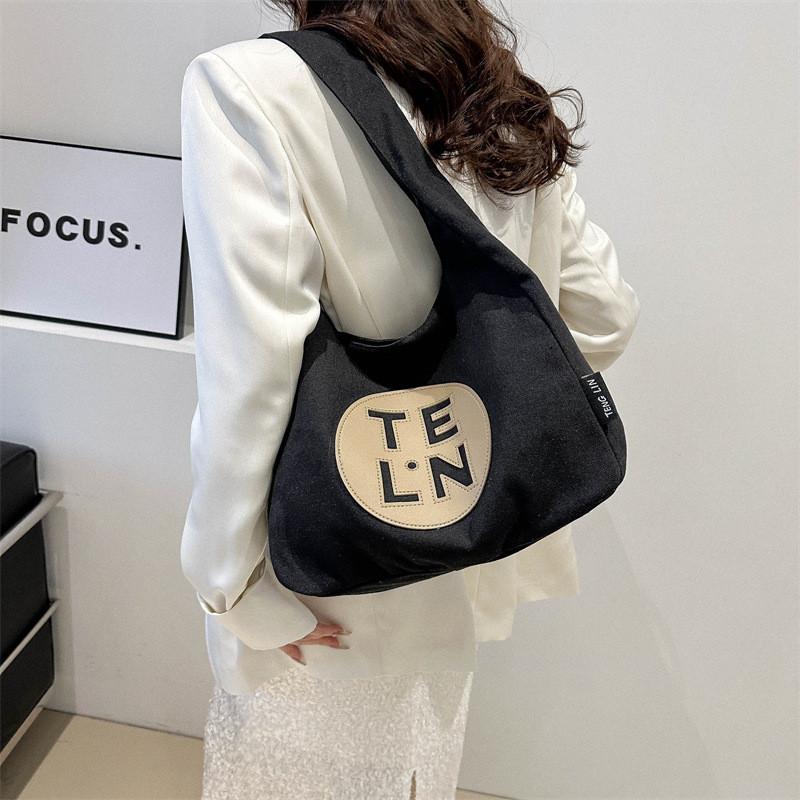 Stylish And Spacious Black Canvas Tote Bag For Women Ideal For Spring Commute And School
